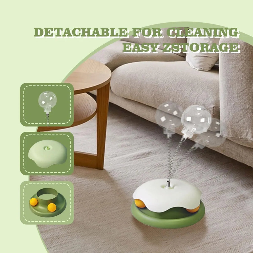 Blue and green cat treat dispenser toy with track ball, measuring 21.5cm by 32cm