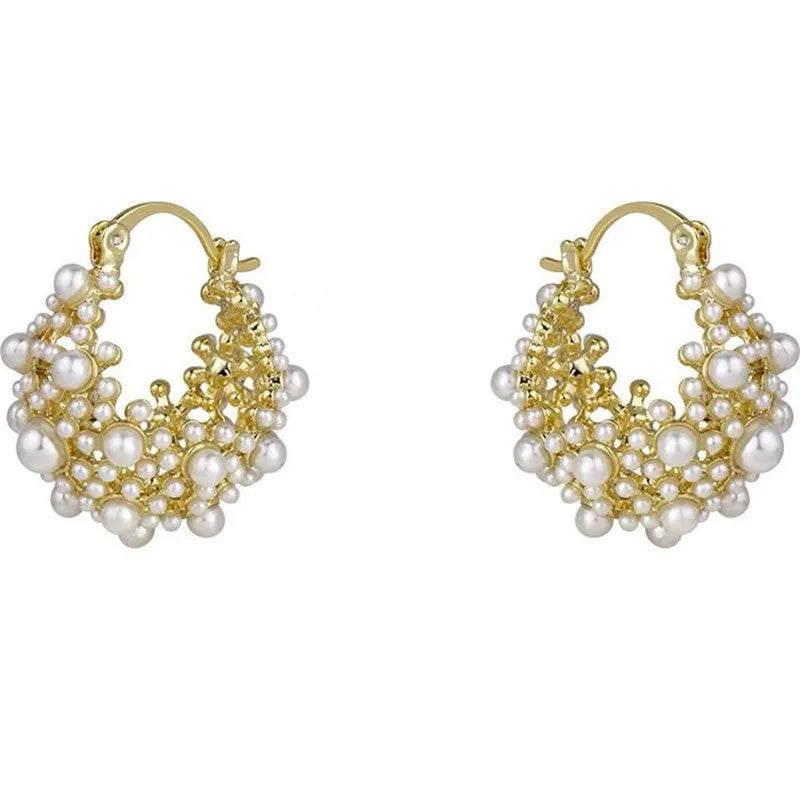 Women's copper flower basket earrings with small rice-shaped beads in gold finish, approximately 3-4 cm diameter
