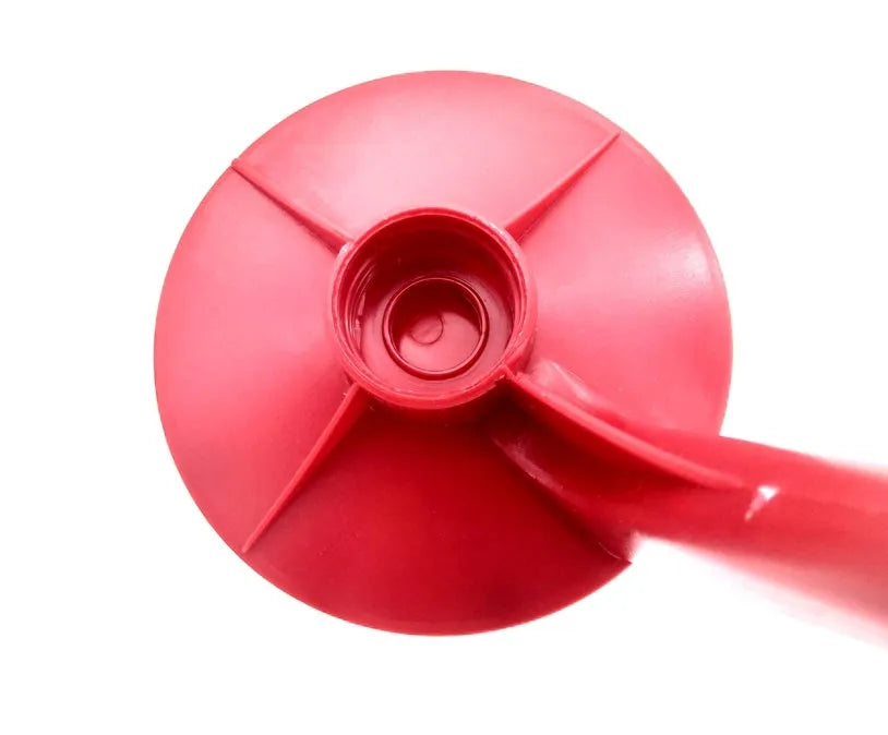Red plastic Magic Tap soda dispenser for 2-litre bottles with push-in serving mechanism