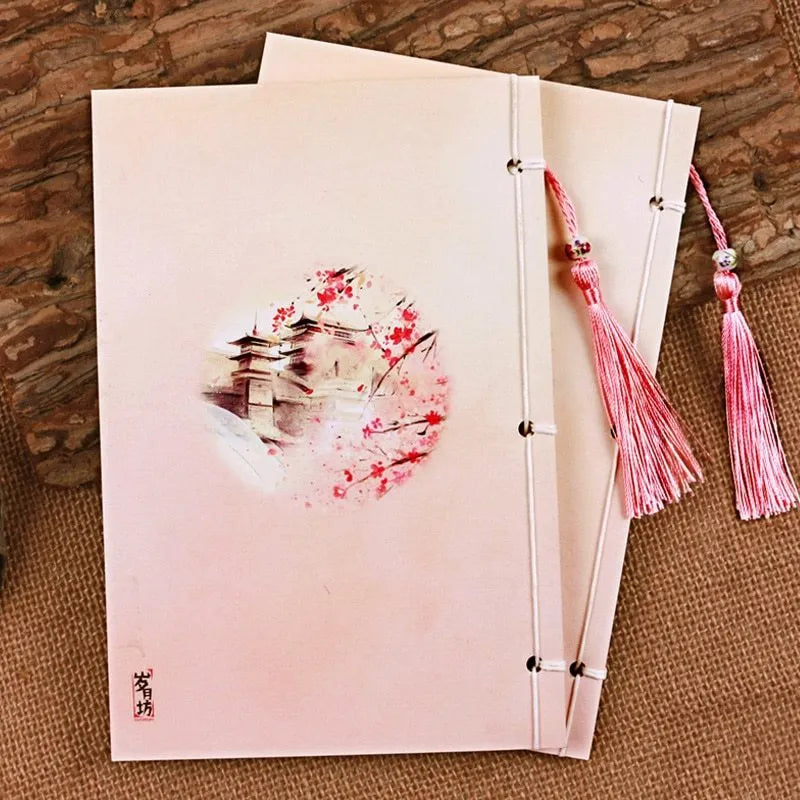 Chinese style thread-bound notebook with watercolour azalea design on cover, showing traditional binding