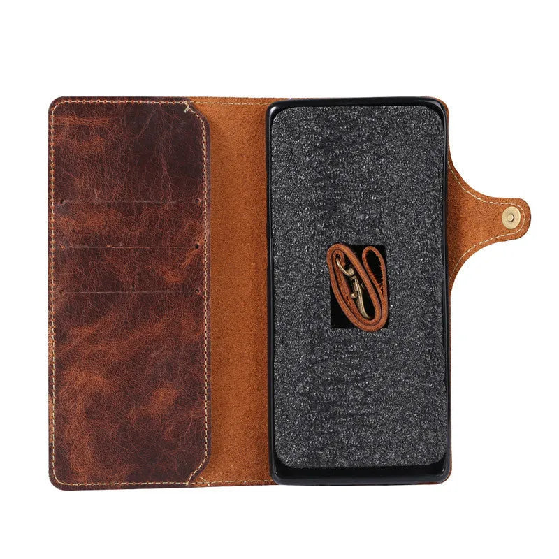 Handmade leather mobile phone case with wallet compartment open showing card slots