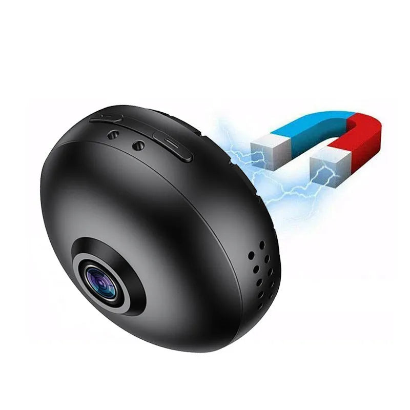 White or black 1080p wireless Wi-Fi surveillance camera with USB cable on a shelf.