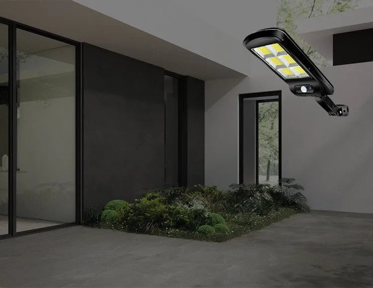Black solar street light with motion sensor for outdoor gardens, showing PIR detection and solar panel