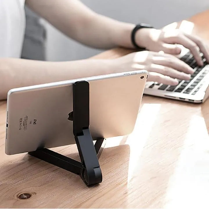Foldable tablet holder in black showing multi-angle adjustment and non-slip rubber surface for device support