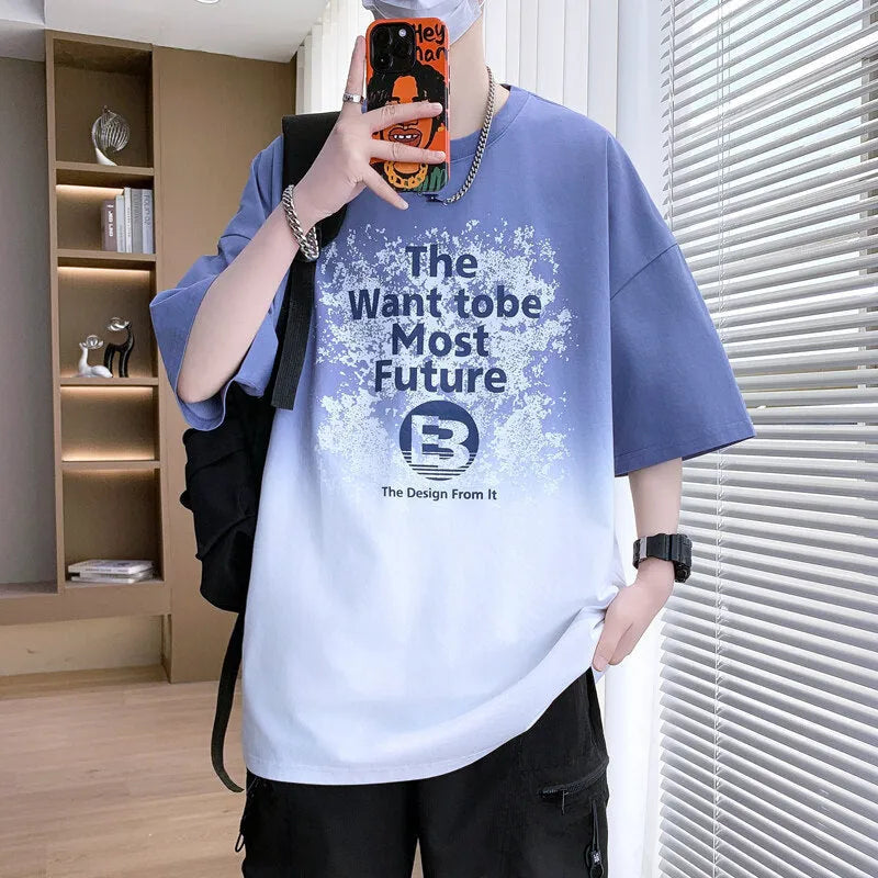 A dark blue boys' printed t-shirt with jacquard text pattern and drop shoulder sleeves.