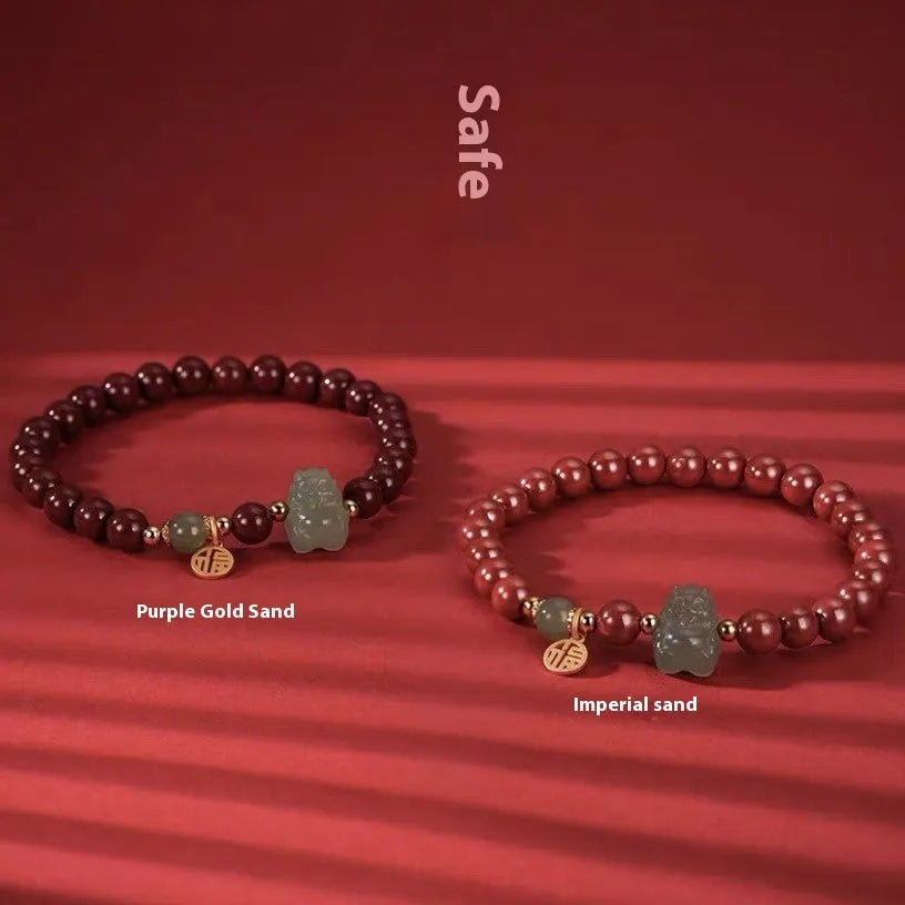 Hetian Jade Cinnabar Bracelet with 8mm beads showing Emperor Sandstone style and Zodiac animal modelling