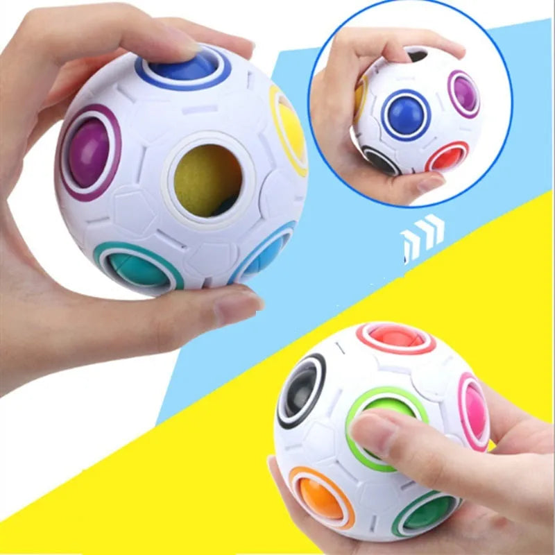 Rainbow coloured plastic ball puzzle with hexagon pattern, 5.5 cm in diameter.