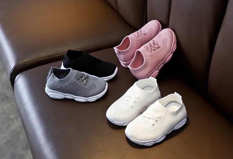 Children's one foot lazy slip-on shoes with fabric upper and non-slip rubber sole in four colour options