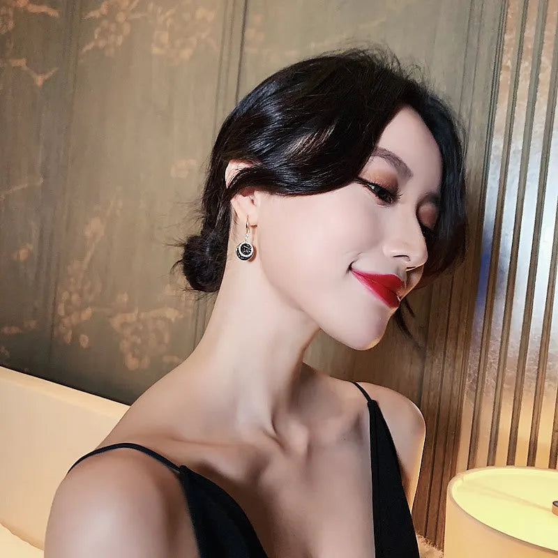 Black geometric alloy earrings with 3.6cm length and round piece design in retro Hong Kong style