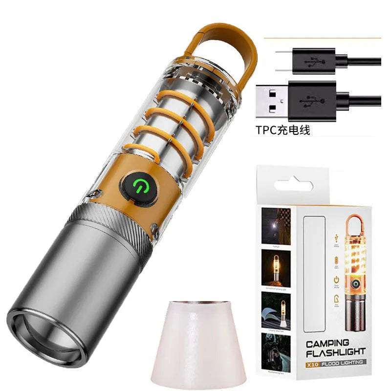 Orange or beige flashlight with dual light source, hook, and keychain, measuring 15cm in length