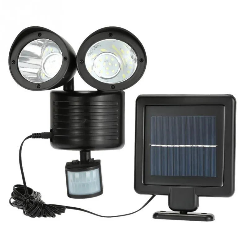 Black and white dual head solar motion sensor spotlight for outdoor security lighting