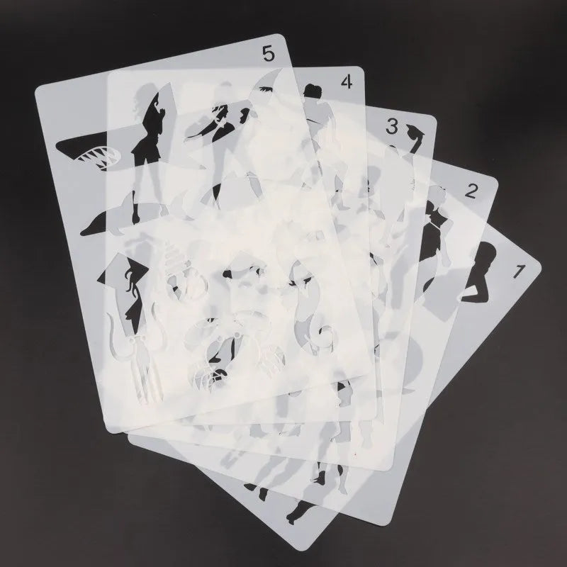White plastic drawing stencil set with 12 reusable templates for sketching and tracing projects
