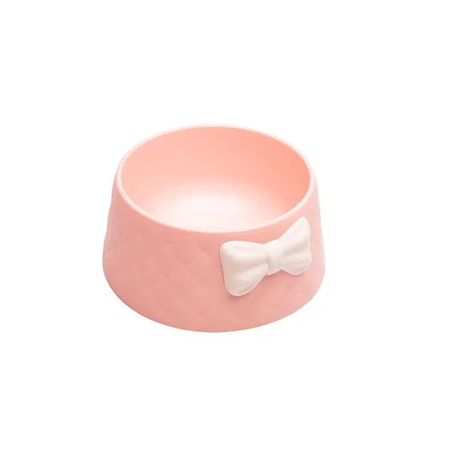Bow-shaped cat bowl dog bowl in PP plastic, shown in pink, green, and grey.