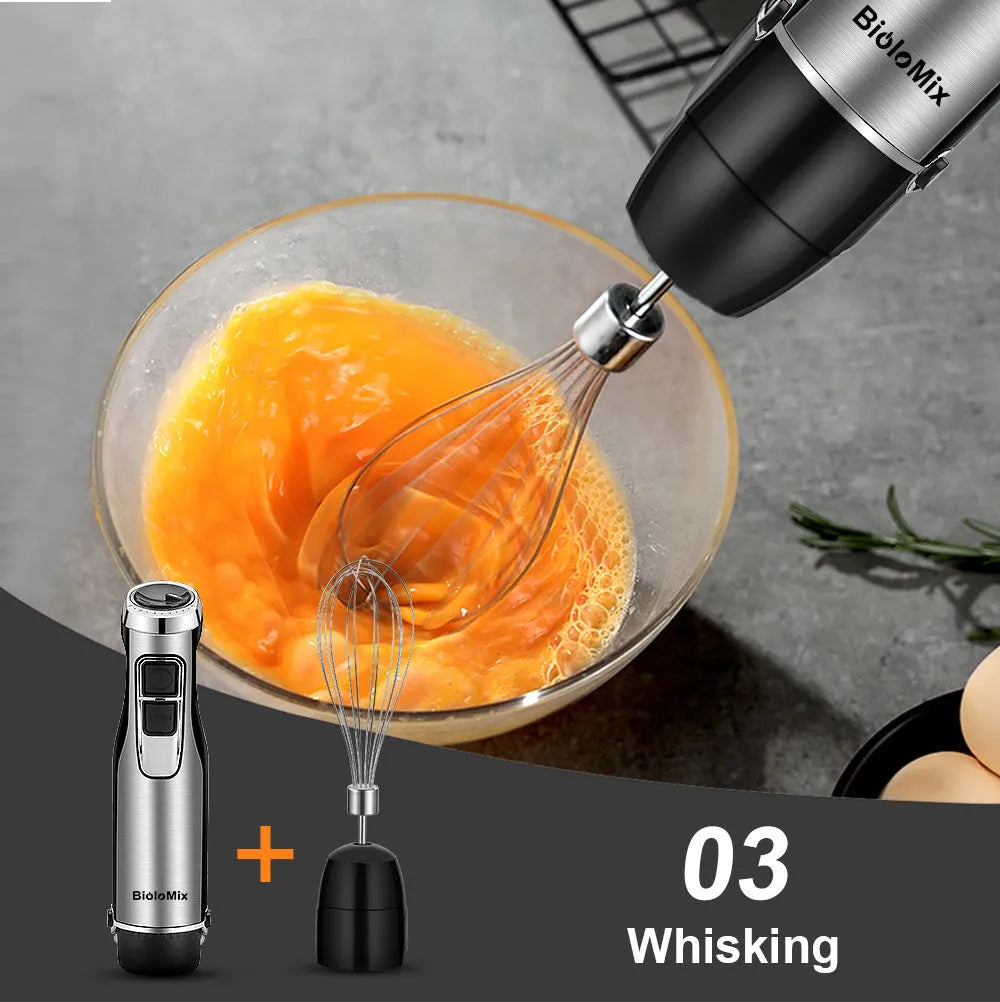 Biolomix silver hand blender with stainless steel attachments including whisk, chopper bowl, and blending beaker