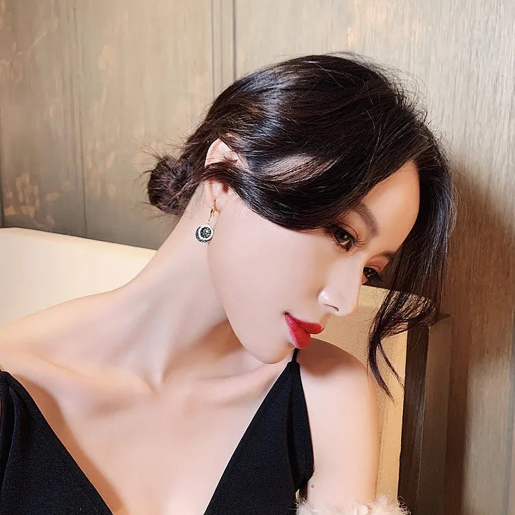 Black geometric alloy earrings with 3.6cm length and round piece design in retro Hong Kong style