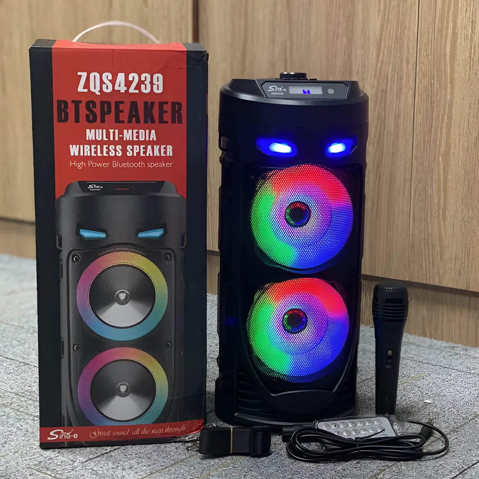 Black portable Bluetooth speaker with dual horn design and wheat-themed accents