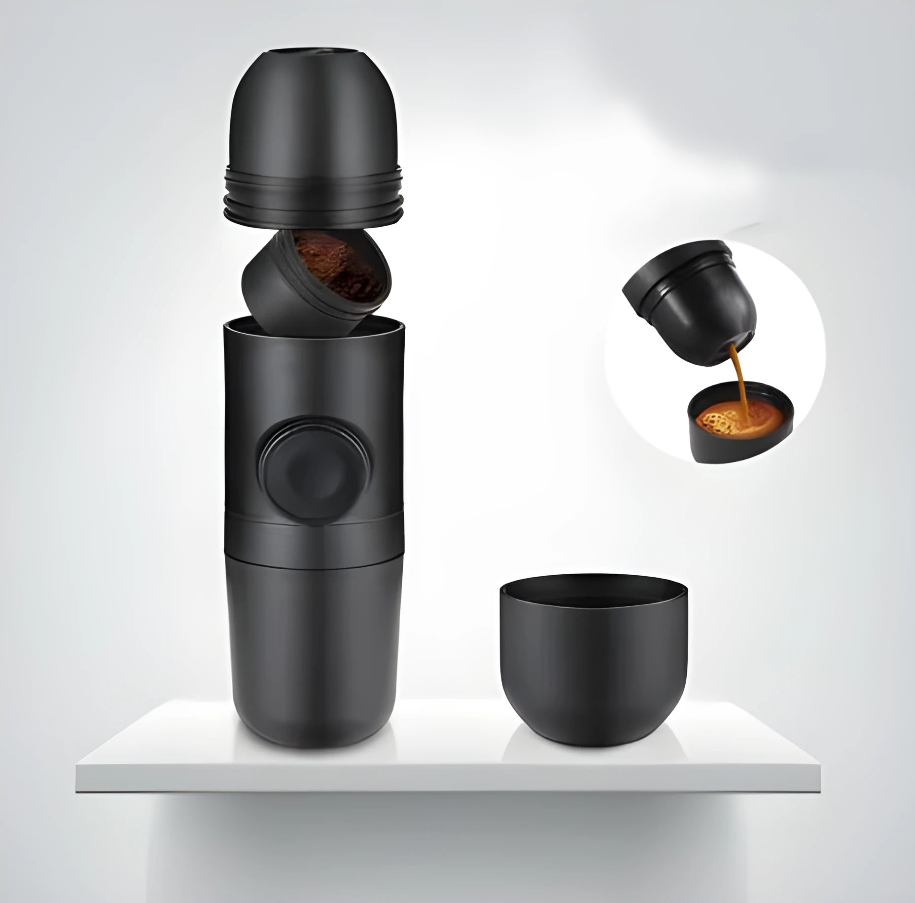 Black portable manual coffee machine showing compact size for travel