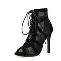 Black suede lace-up high heel women's shoes with 11.5cm heel and 1cm platform, showing adjustable laces and textured surface