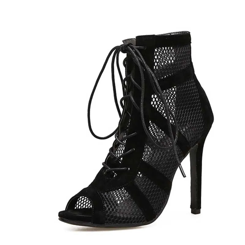 Black suede lace-up high heel women's shoes with 11.5cm heel and 1cm platform, showing adjustable laces and textured surface