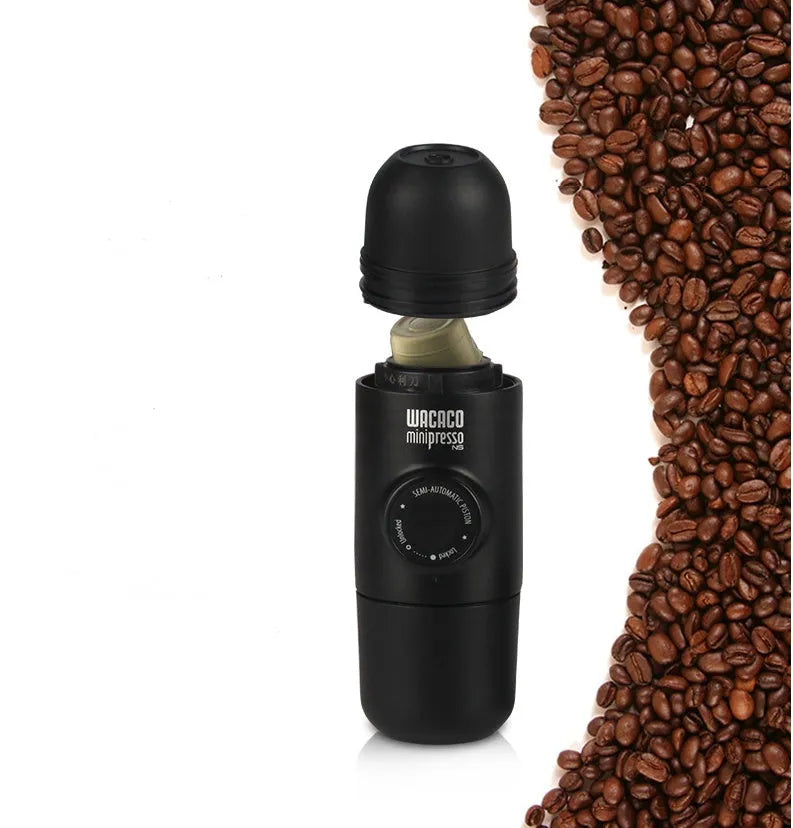 Black portable manual coffee machine showing compact size for travel
