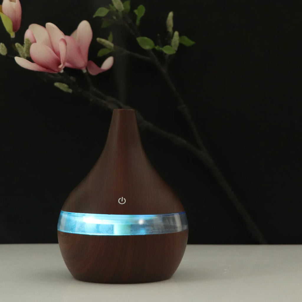 Columnar USB mini air humidifier in light wood grain finish with remote control