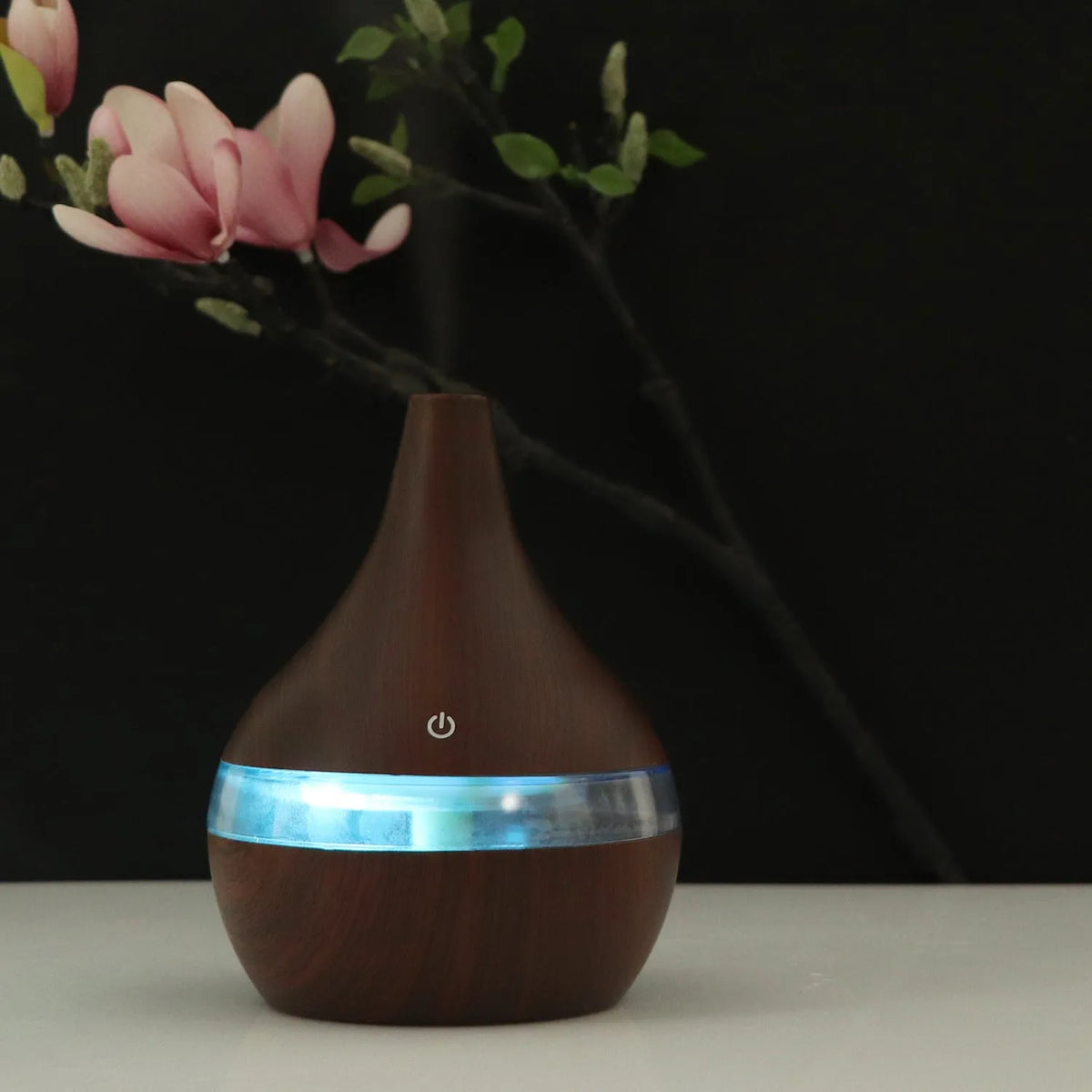 Columnar USB mini air humidifier in light wood grain finish with remote control