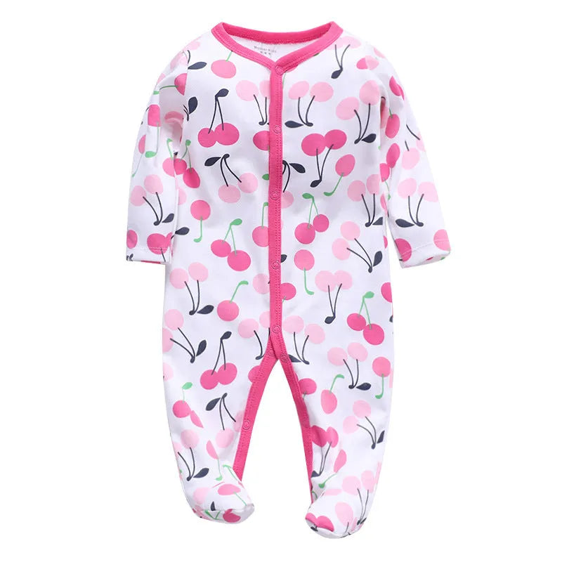 Cotton one-piece baby romper with long sleeves, shown in dinosaur print and other style options for 0-12 month infants.