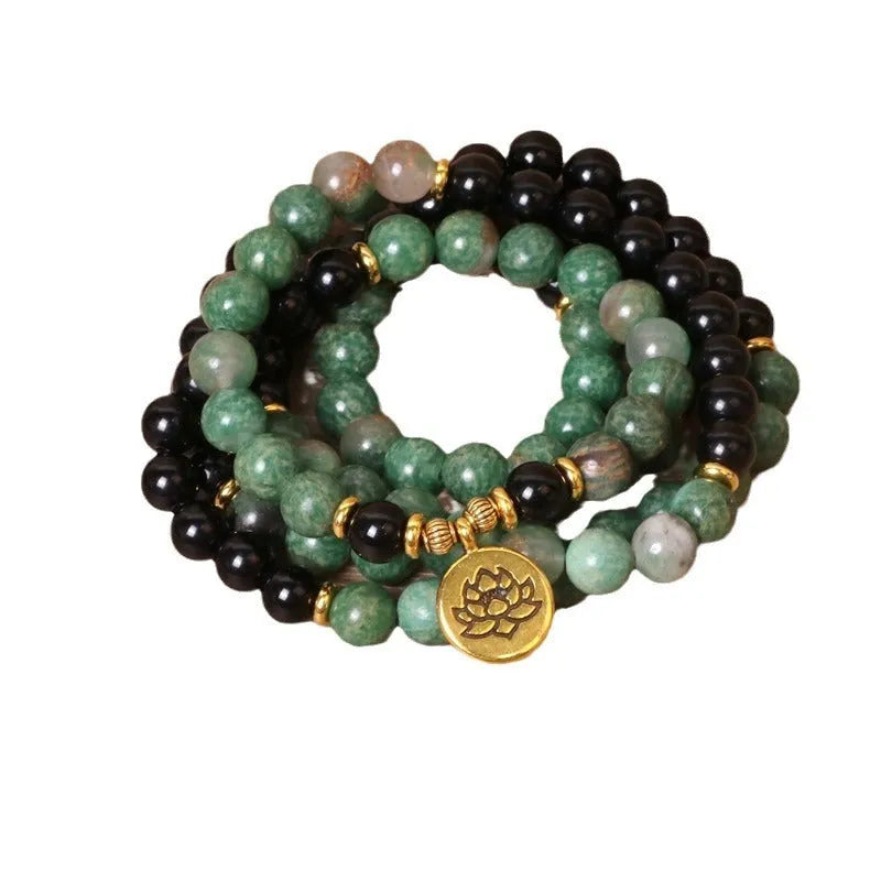 Green and black elastic beaded long bracelet with alloy material and adjustable sizing