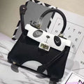 Panda handbag in first-layer cowhide with animal print, showing horizontal square shape and two size options