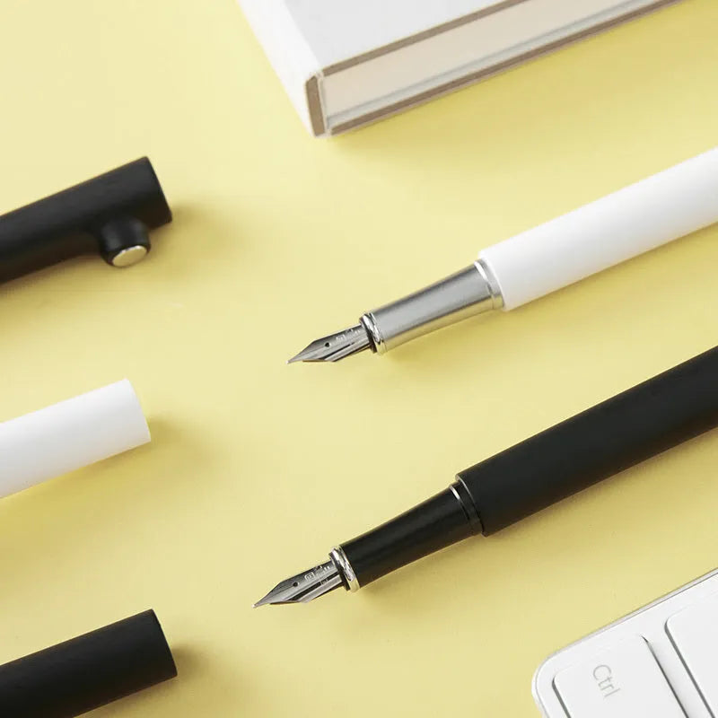 Red dot award winning black and white magnet pen with 0.7mm stainless steel tip for student writing.