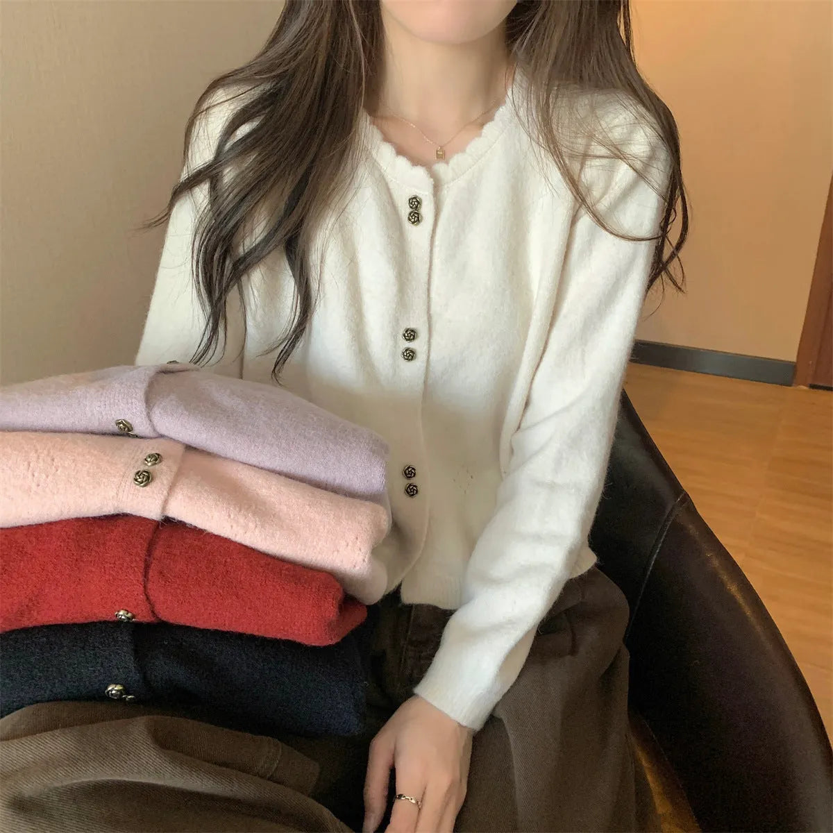 Women's long-sleeved acrylic cardigan coat in free size showing front opening and regular sleeve design