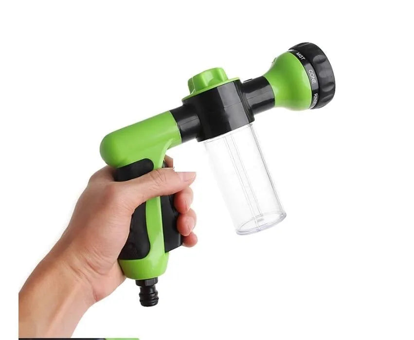 Green high-pressure foam spray gun with adjustable nozzle for car washing and household cleaning, showing eight spray types and 15cm by 21cm size