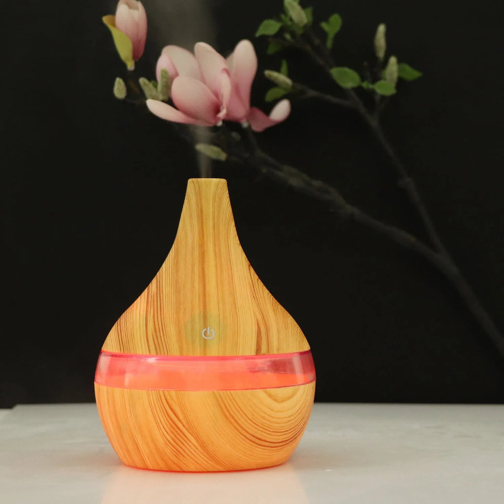 Columnar USB mini air humidifier in light wood grain finish with remote control