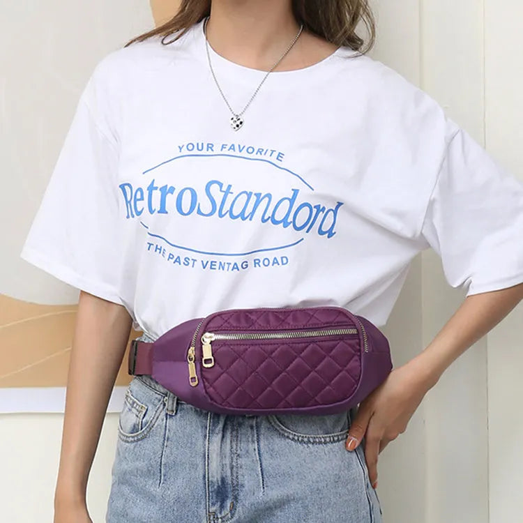Rhombus nylon fanny pack for women in solid colour with zipper pockets and single soft handle for crossbody or waist wear.