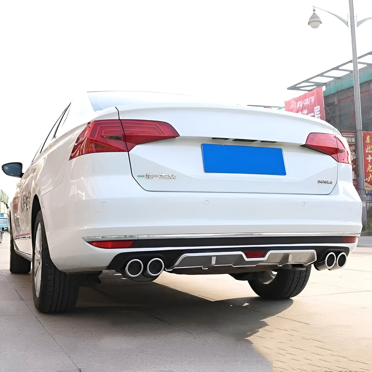 Automotive rear bumper lip spoiler in PP plastic showing all black and silver black colour variations