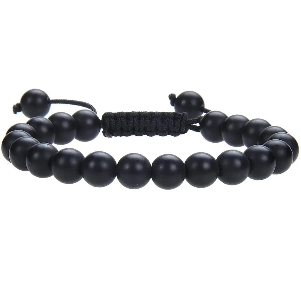 Women's flat knot braided healing bracelet with geometric texture and gemstone beads