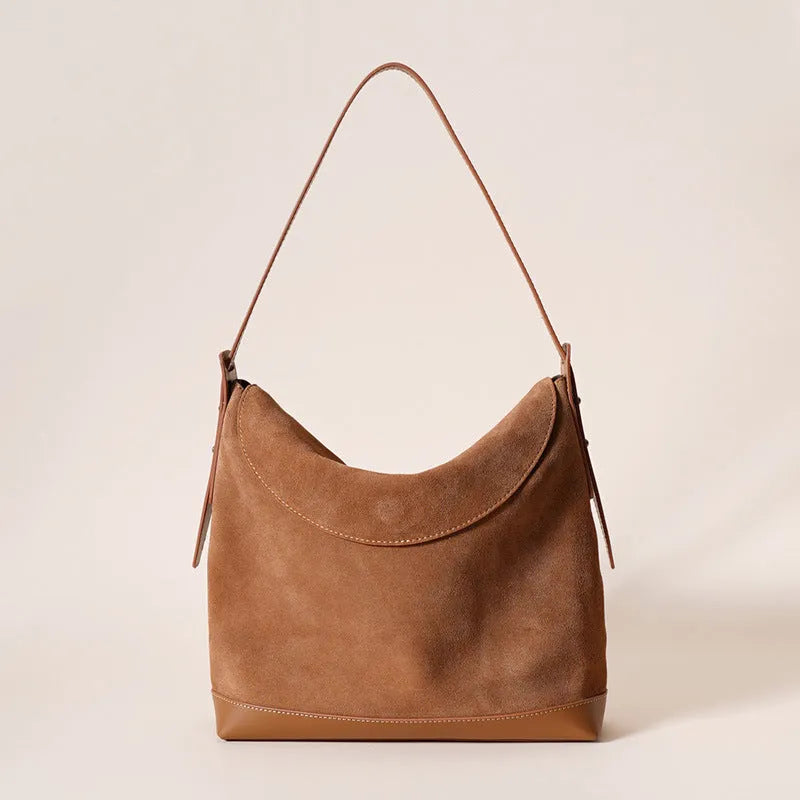 Genuine leather women's shoulder bag in retro style with clamshell design and internal organisers