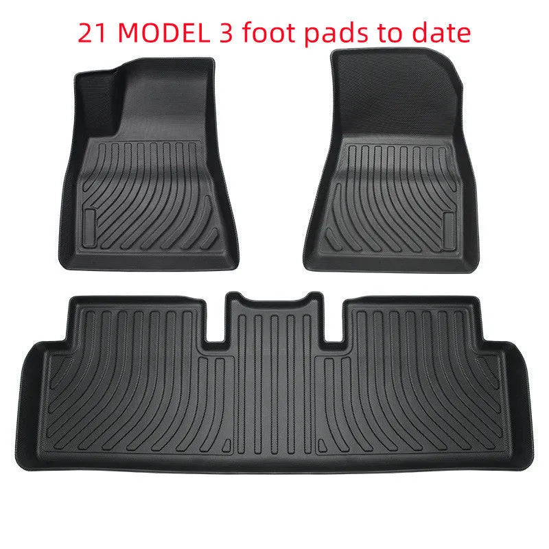 Rubber floor mats for Tesla cars with TPE footrest, custom-fit to Model 3, Y, S, X interiors, showing non-slip backing and textured surface