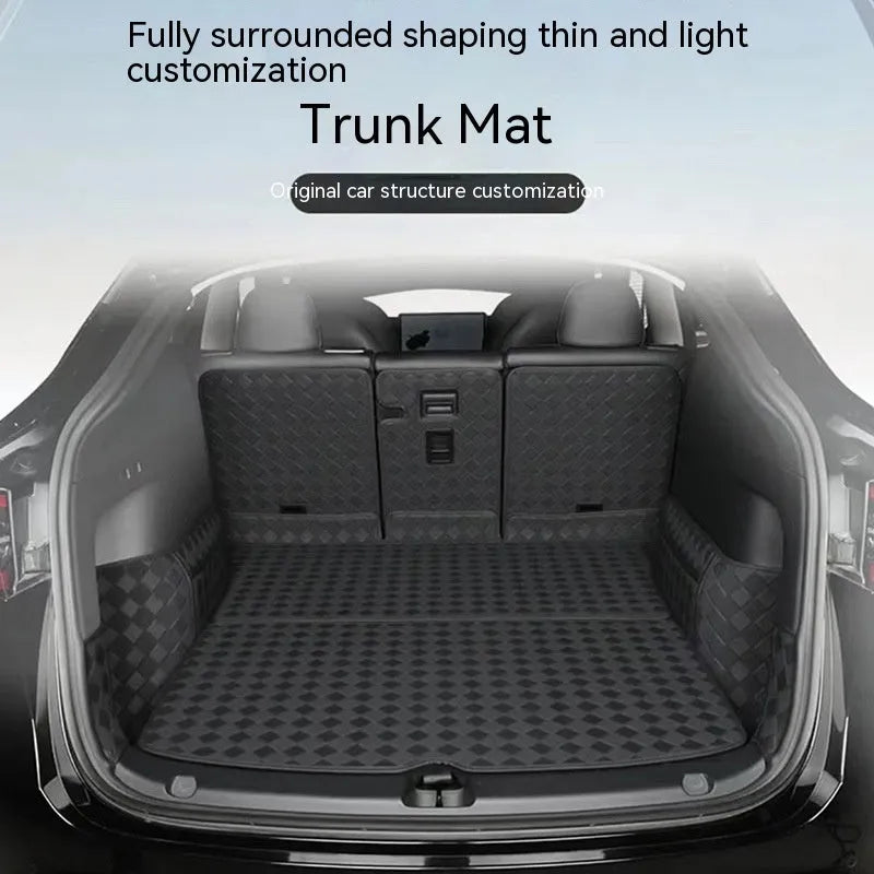 Leather trunk mat for Tesla Model 3 and Model Y in black, shown in car boot.