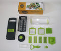 Grey stainless steel vegetable cutter with interchangeable blades and kitchen accessories