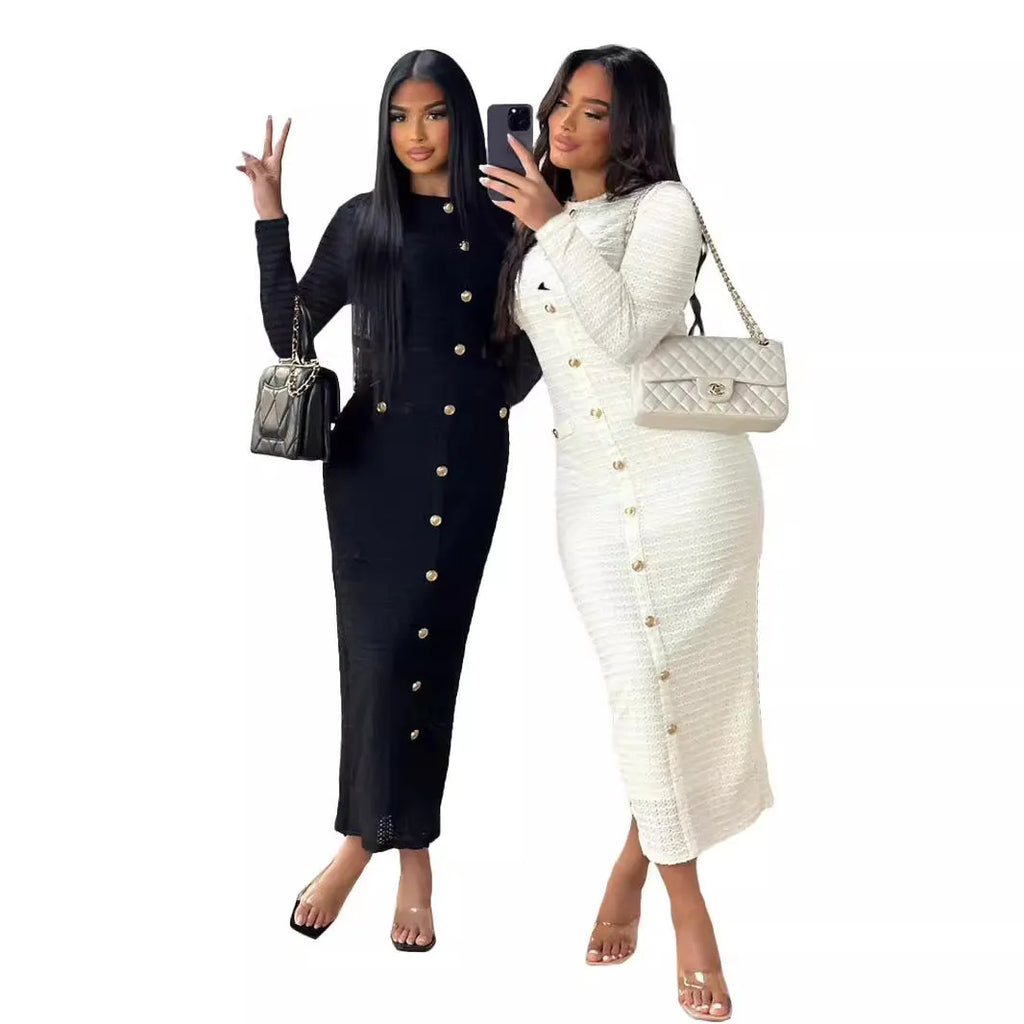 Retro French slim fit knitted long sleeve dress in black with button detail and a one-step skirt.