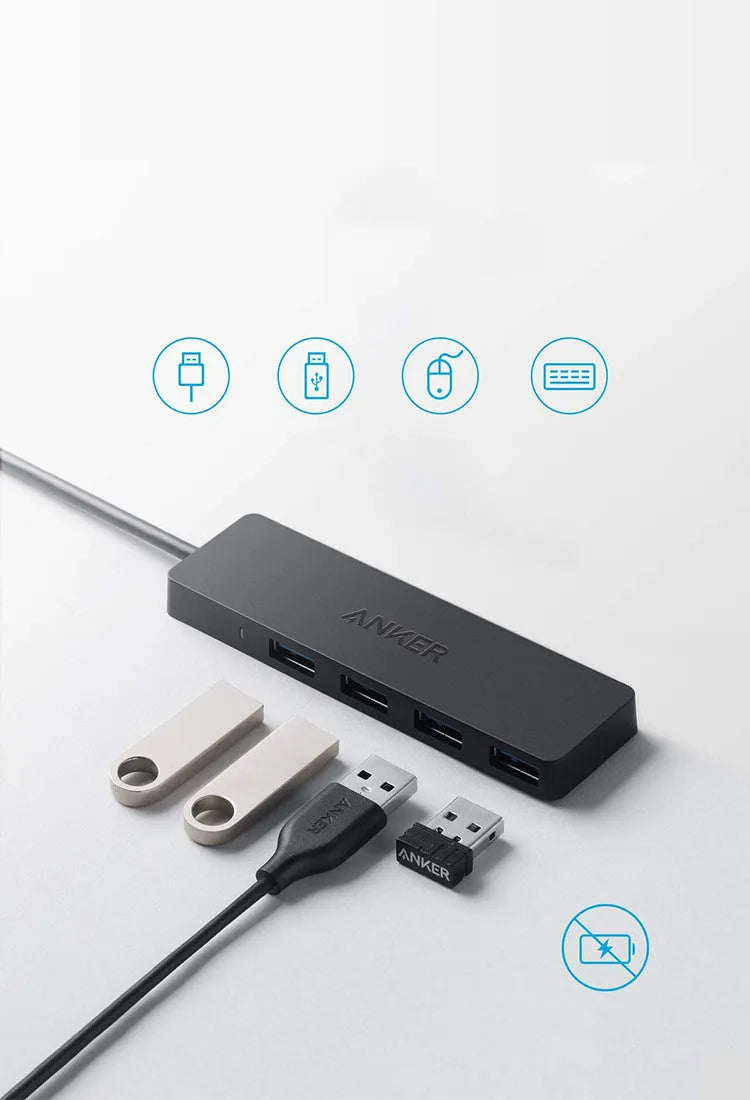 Black Anker USB 3.0 hub with four ports and a 20cm cable on a desk.