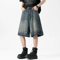 Men's retro washed blue denim shorts with five-point ripped splash ink design in straight cut