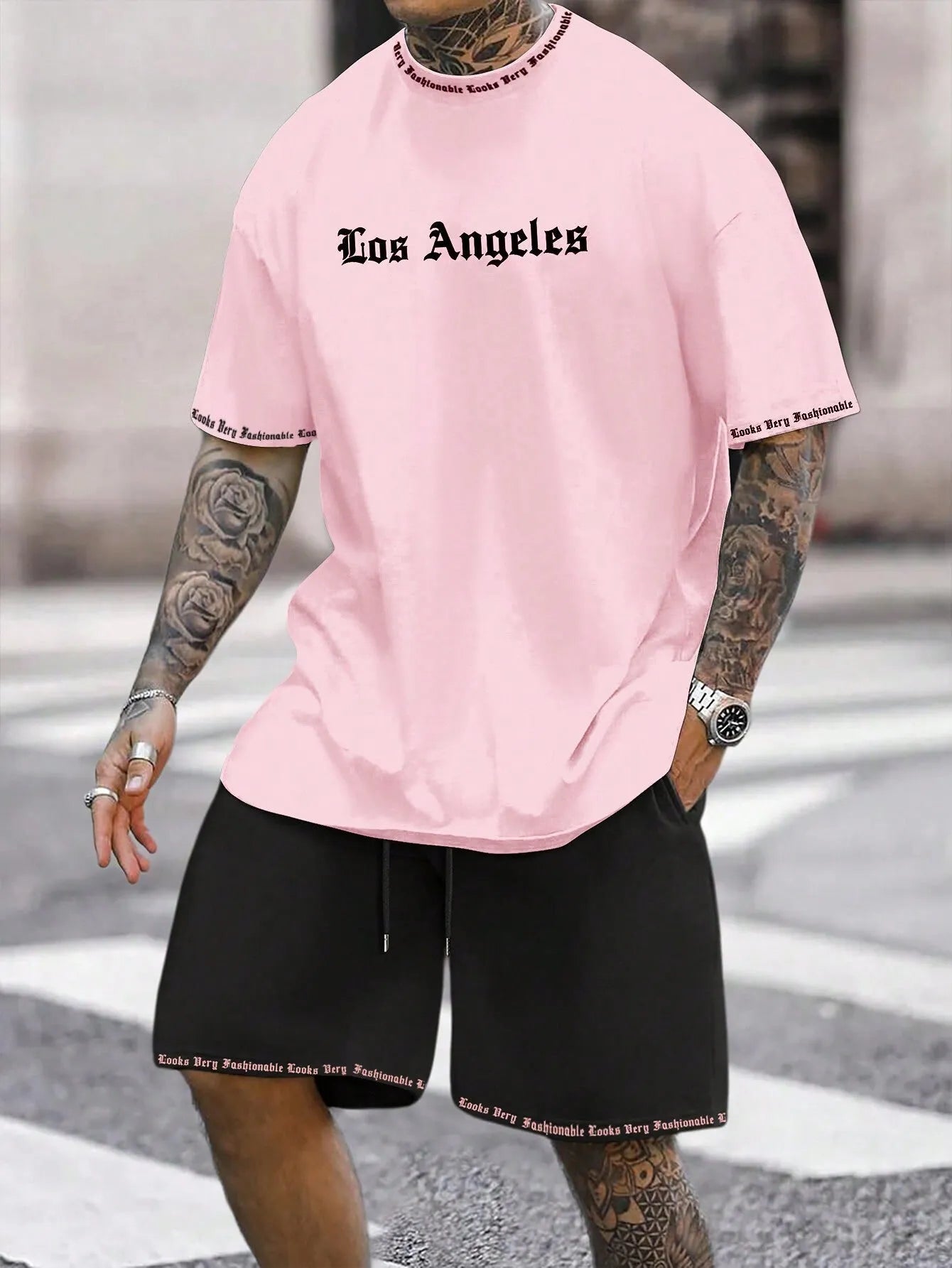 Sports style short-sleeved top and shorts set in polyester blend fabric, available in multiple colours and sizes