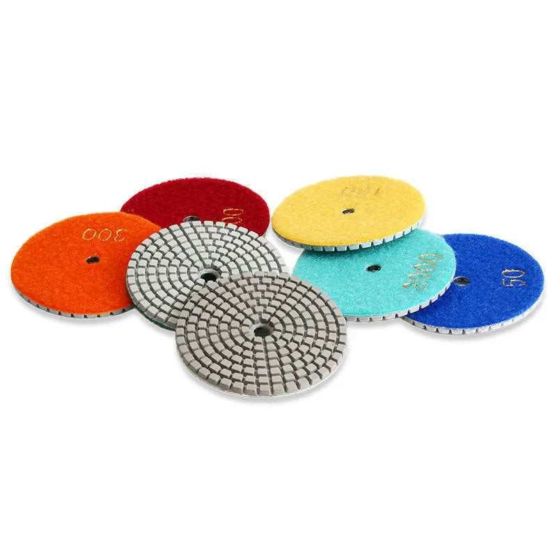 10-piece set of 80mm stone polishing pads with emery abrasive and 10mm centre holes