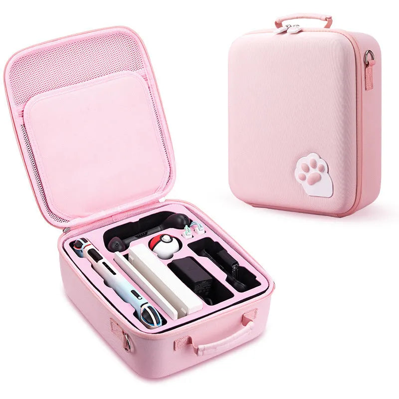 Pink Nintendo Switch storage bag with cat claw design, showing game cartridge slots and diagonal carry strap.