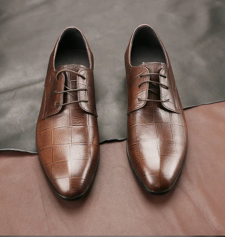Men's black leather Derby shoes with pointed toe, handmade sewing details, and antiskid rubber sole