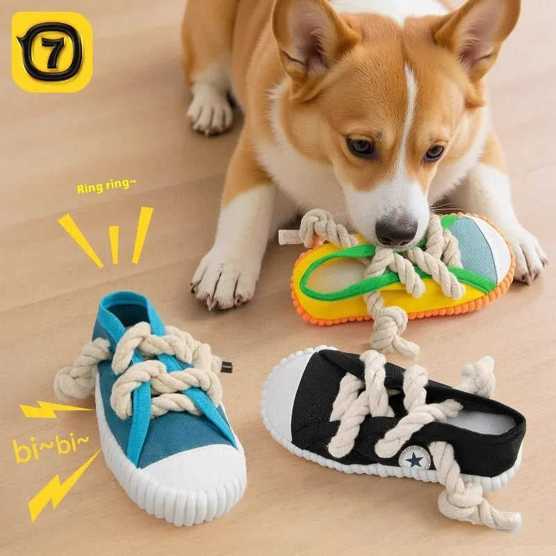 Yellow flexible dog chew toy shaped like slipper with textured surface for dental cleaning