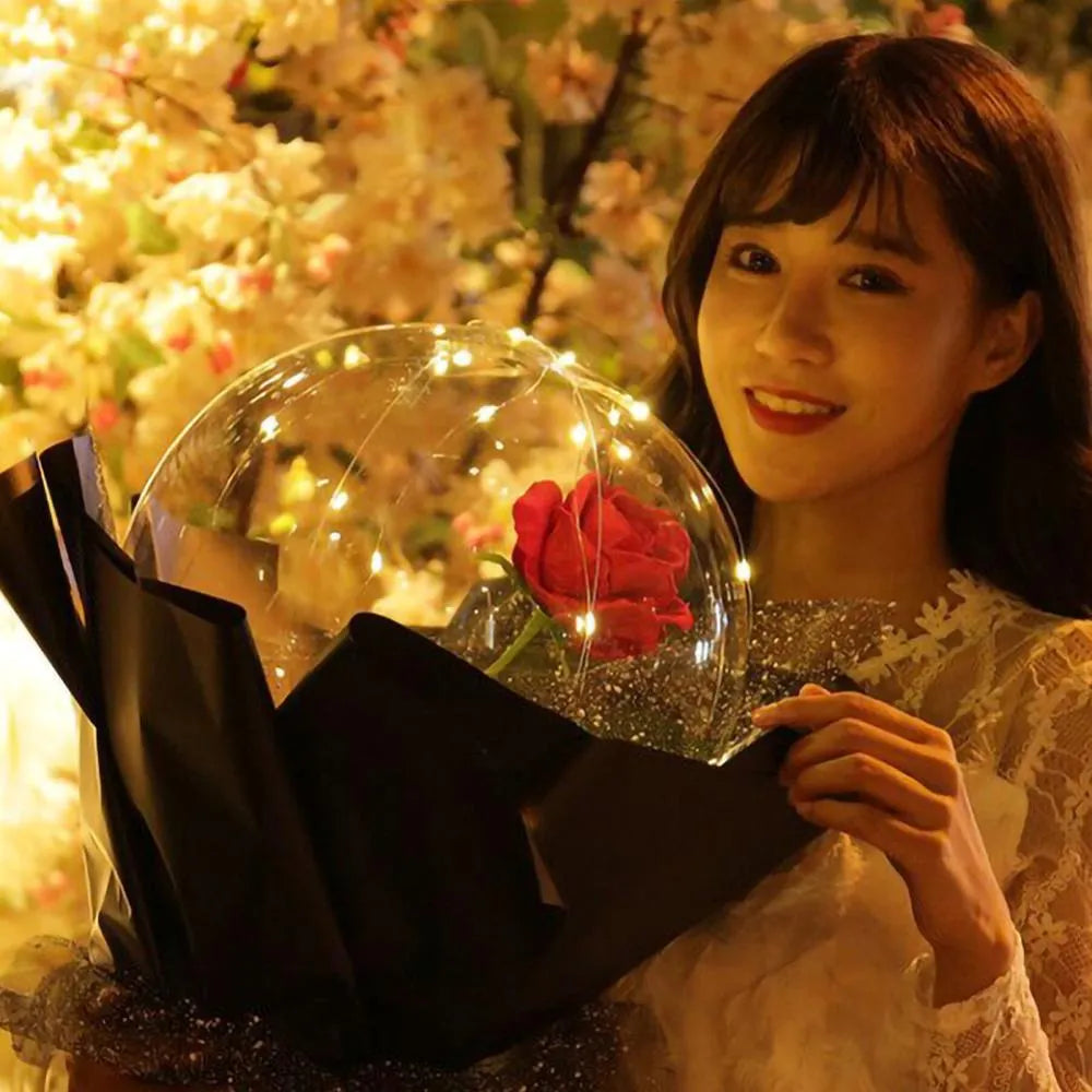 LED luminous balloon rose bouquet with transparent bobo ball design, artificial flowers, and LED lights for DIY Valentine's Day decorations