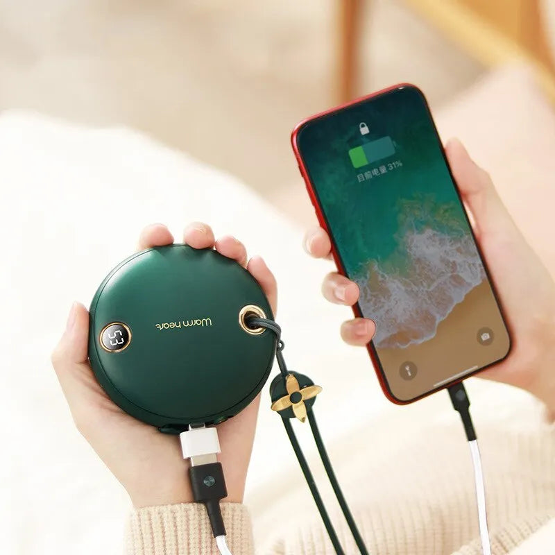 Green hand warmer power bank showing digital display with 5000mAh capacity and Type-C port